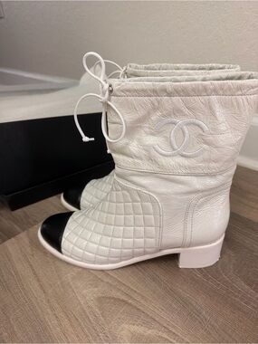 CHANEL White Quilted Leather Ankle Boots with Black Cap Toe and Drawstring
